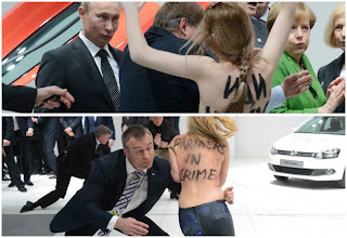 Vladimir Putin, la cancelliera Merkel, una XL1 e le femministe di Femen